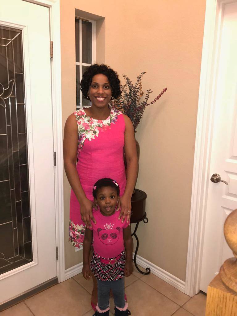 Mother and daughter in pink for breast cancer