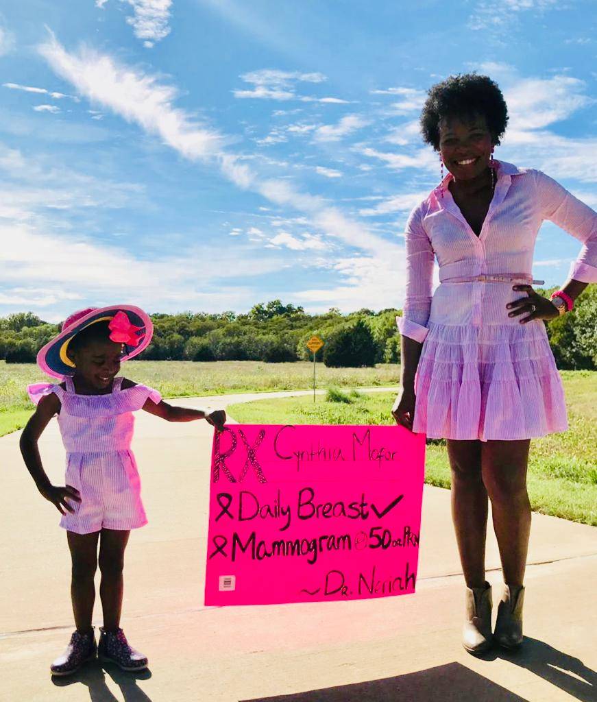 Mother and daughter in pink for breast cancer